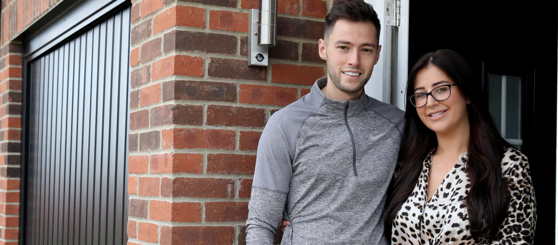 Couple on doorstep