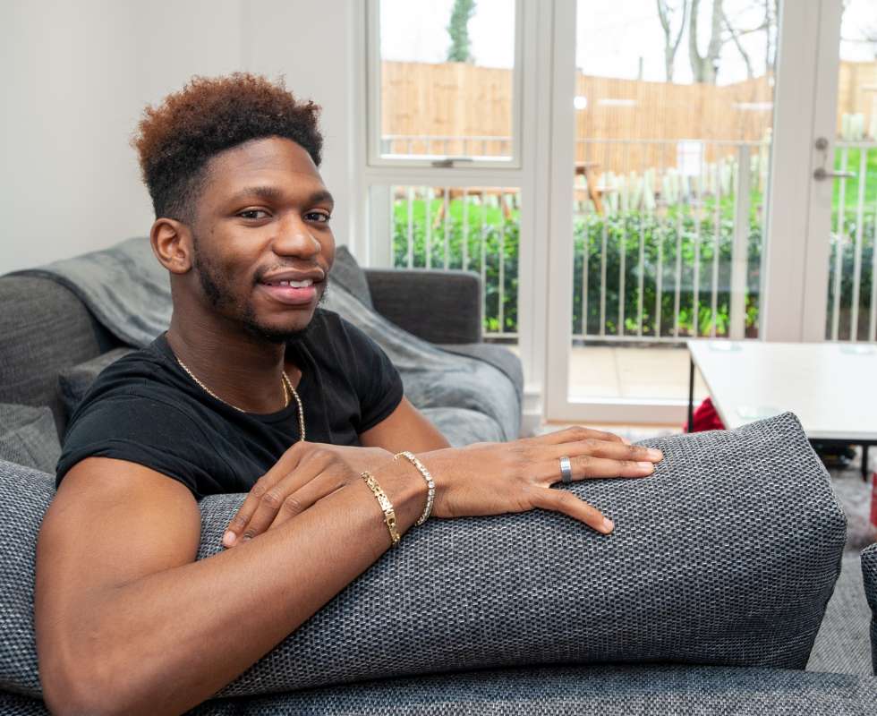 Michael on a sofa