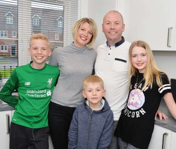 Family in kitchen